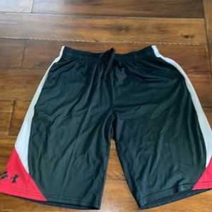 Under Armor youth xl shorts. Black, red, and white.